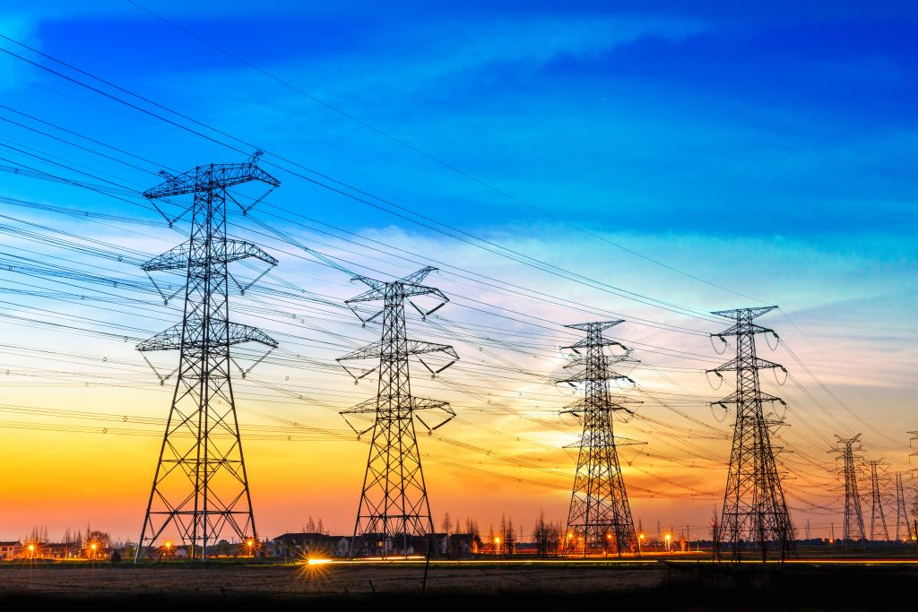 high voltage post,High voltage tower sky sunset background